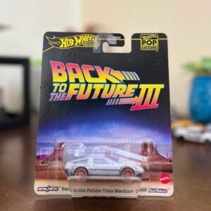 Hot Wheels Premium Back to the Future Time Machine 1955 die-cast model in silver.