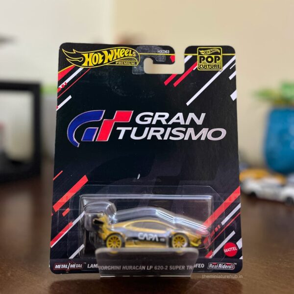 Hot Wheels Premium Lamborghini Huracán LP 620-2 Super Trofeo Gran Turismo die-cast model in gold.