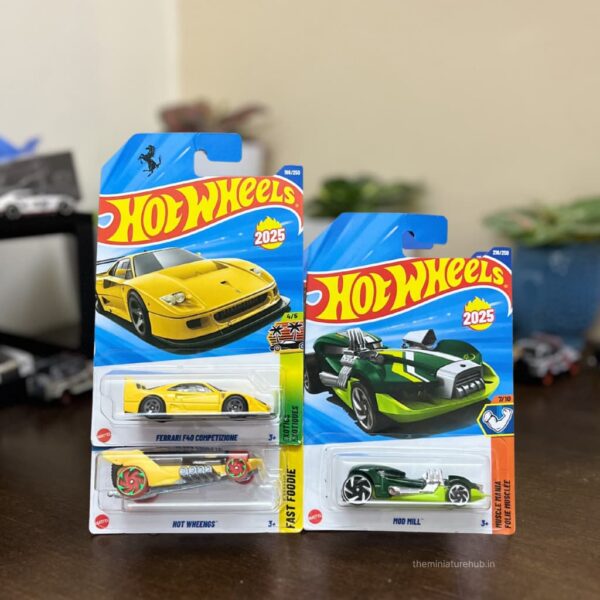 Hot Wheels Pack of 3 – Ferrari F40 Competizione (Yellow), Hot Wheengs, and Mod Mill. Authentic 1:64 scale diecast car set available at The Miniature Hub.