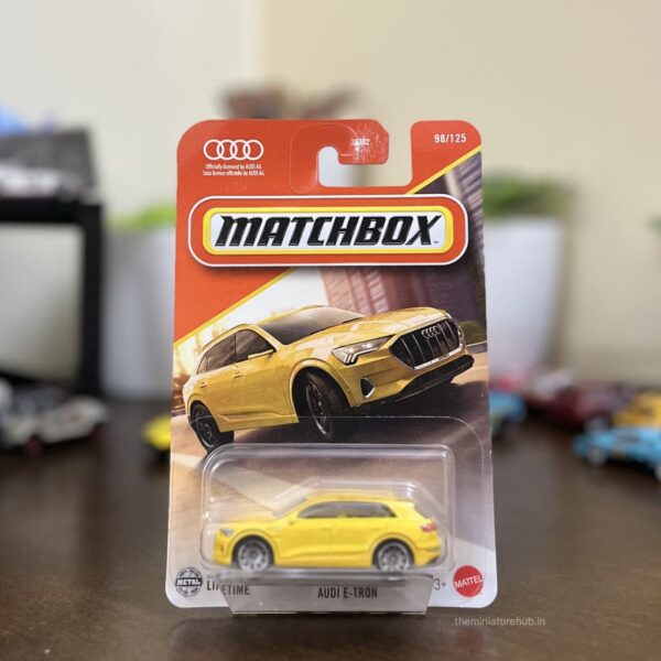 Matchbox Audi E-Tron Yellow die-cast SUV collectible in 1:64 scale
