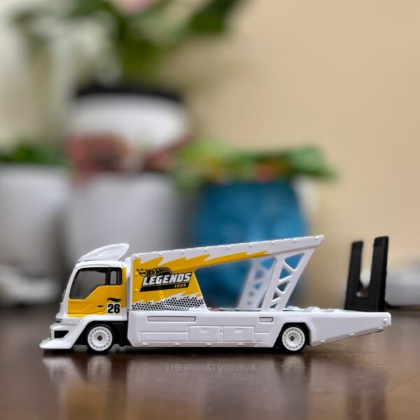 Hot Wheels Team Transport Kousoku Hauler uncarded side view with Real Riders wheels